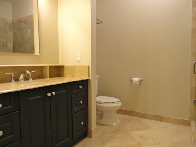 75 Stone Ridge Way, Unit 3A Fairfield, CT 06824 - Photo 15 of 27 a bathroom with a sink and a toilet