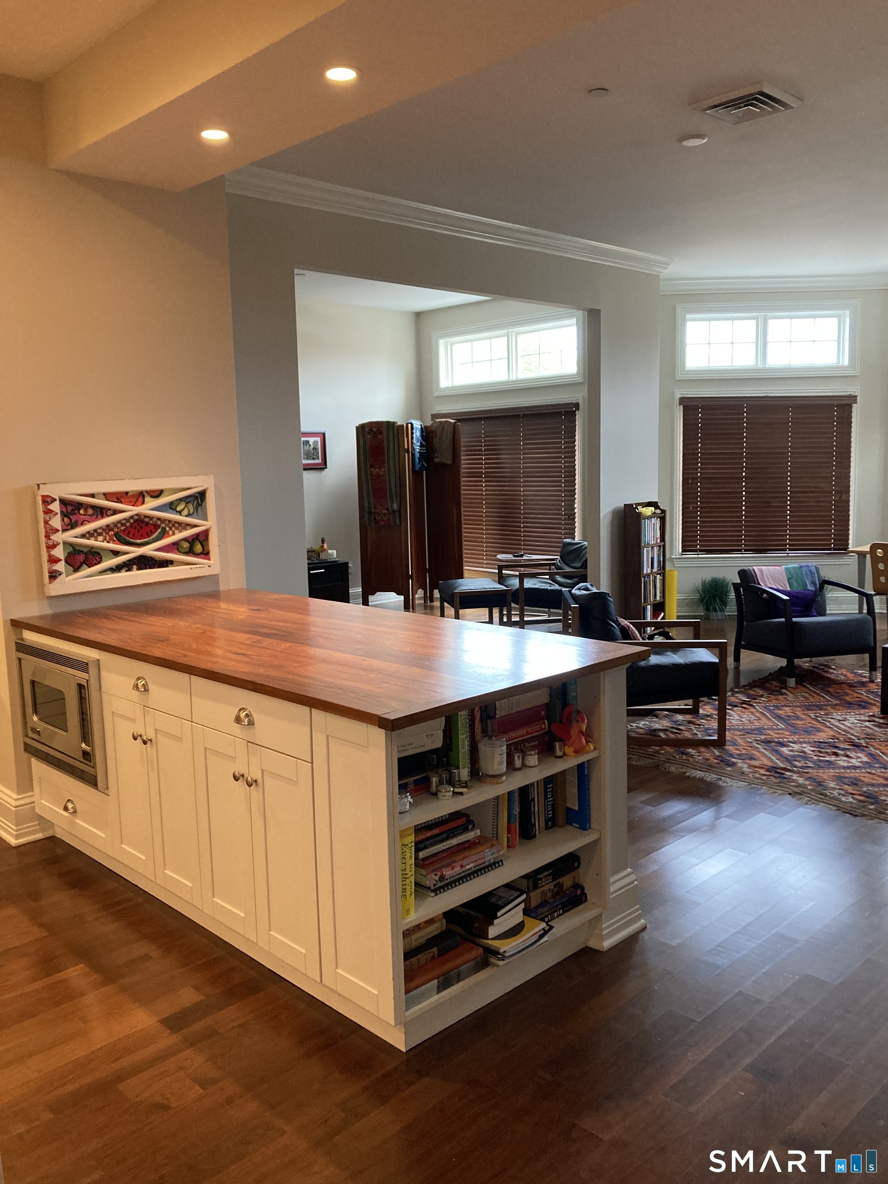 75 Stone Ridge Way, Unit 3A Fairfield, CT 06824 - Photo 10 of 27 a kitchen with stainless steel appliances a stove a sink and a refrigerator
