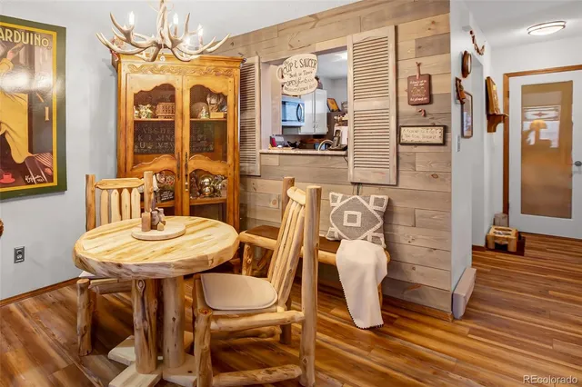 a living room with fireplace furniture and a flat screen tv