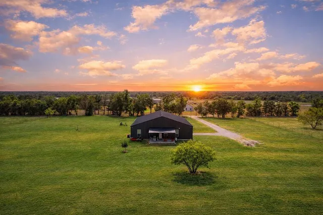 a view of a lake with a yard