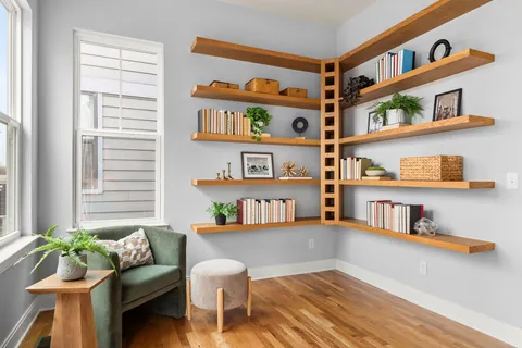 a living room with furniture and a window