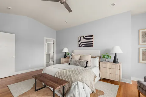a bathroom with a shower sink vanity granite and shower