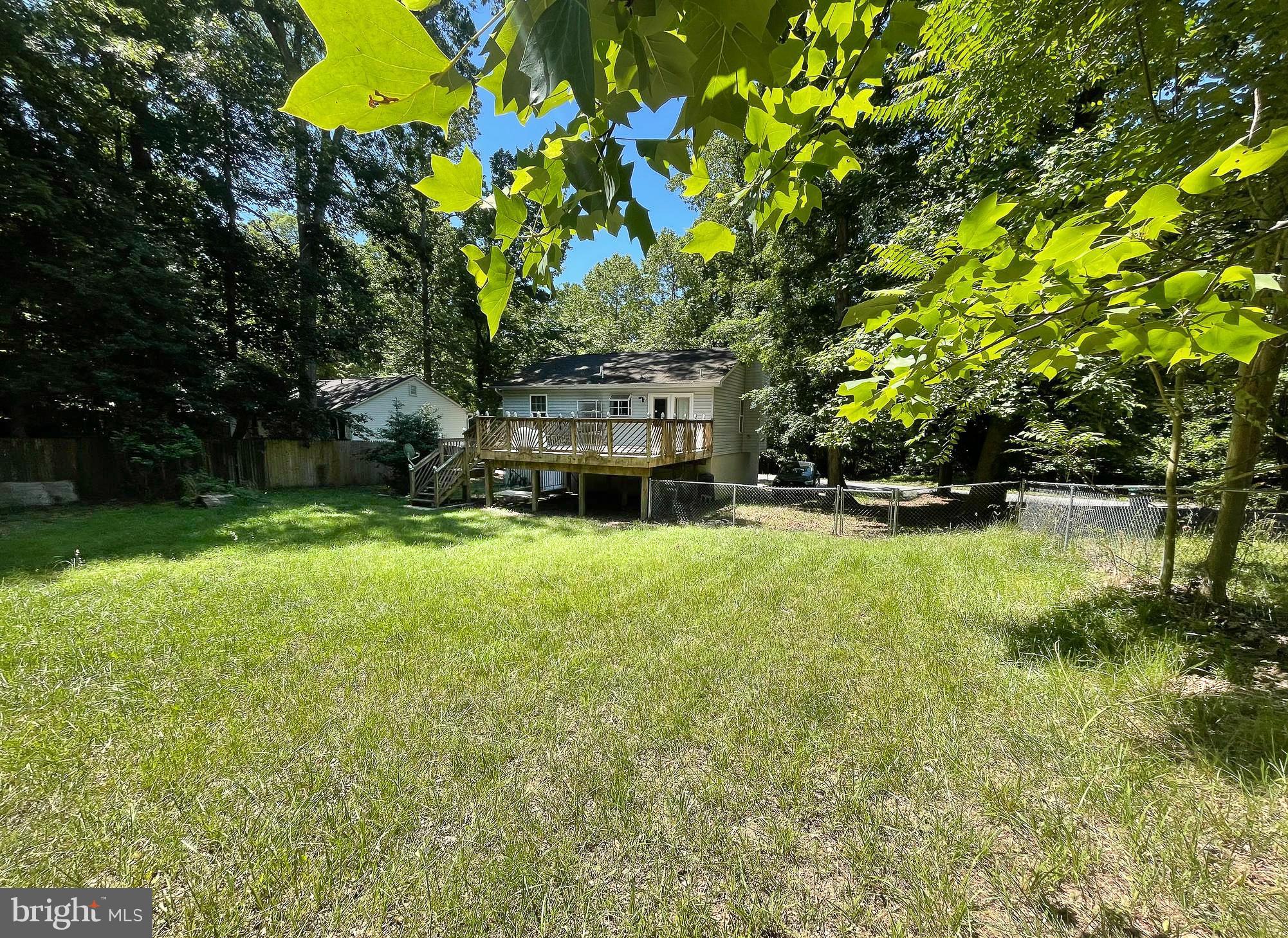 1084 Rimrock Road Lusby, MD 20657 - Photo 3 of 29 Spacious rear yard with fencing