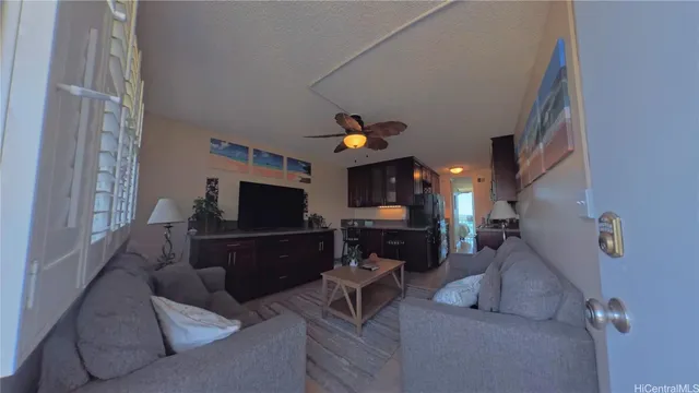 a kitchen with a sink a stove and cabinets