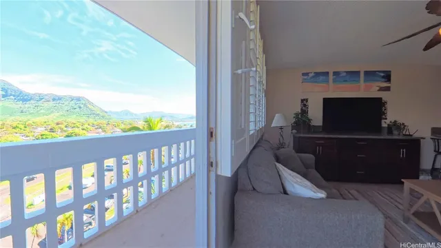 a view of wooden floor and a building in the background