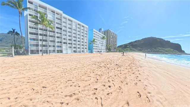 a view of a building with a yard