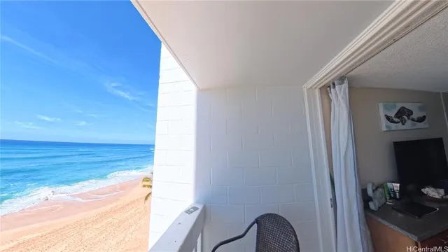 a view of floor to ceiling window and hardwood