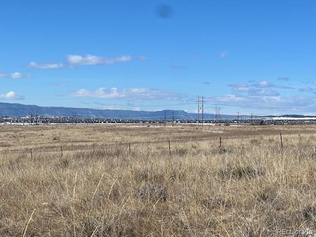 North Blaney Road Peyton, CO 80831 - Photo 21 of 21 a view of an ocean and a beach