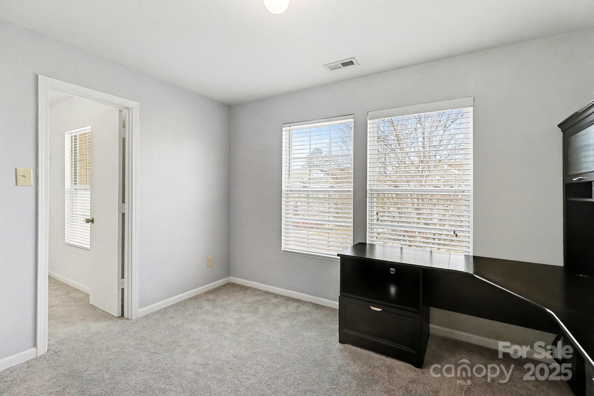 3901 Shasta Circle Clover, SC 29710 - Photo 16 of 36 a room with a window and a night stand
