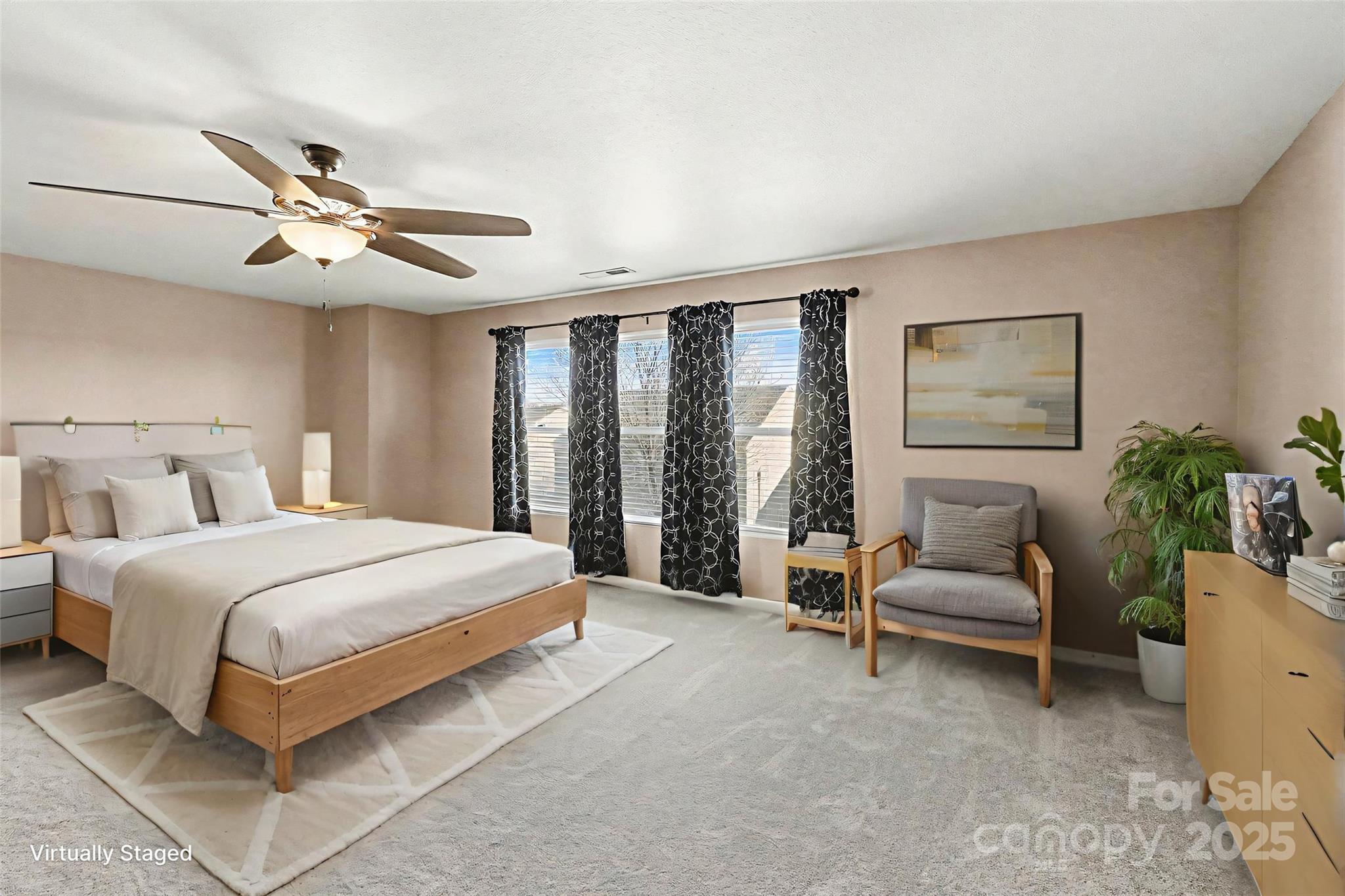 3901 Shasta Circle Clover, SC 29710 - Photo 22 of 36 a bedroom with a bed couch chandelier and a window