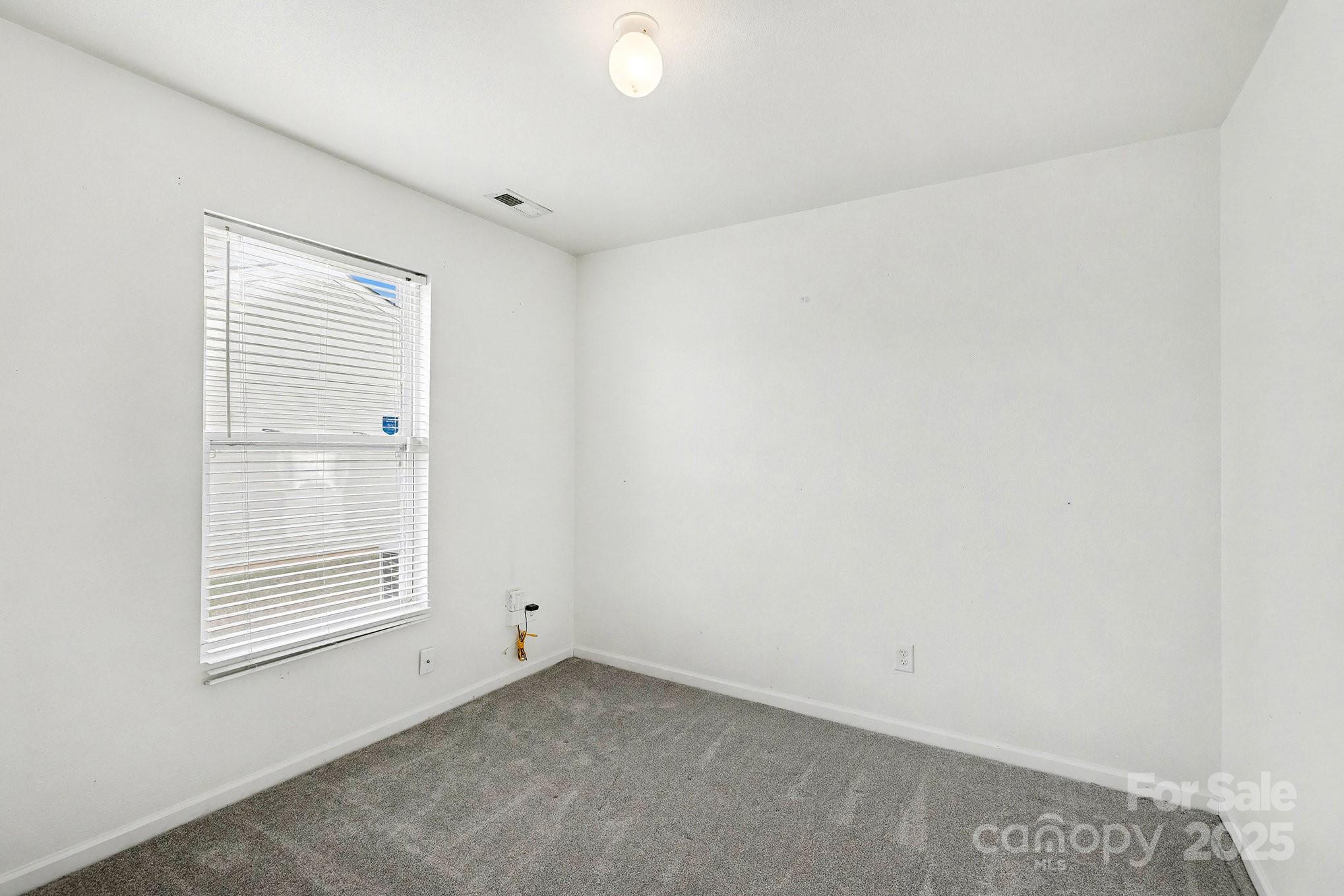 3901 Shasta Circle Clover, SC 29710 - Photo 25 of 36 an empty room with windows