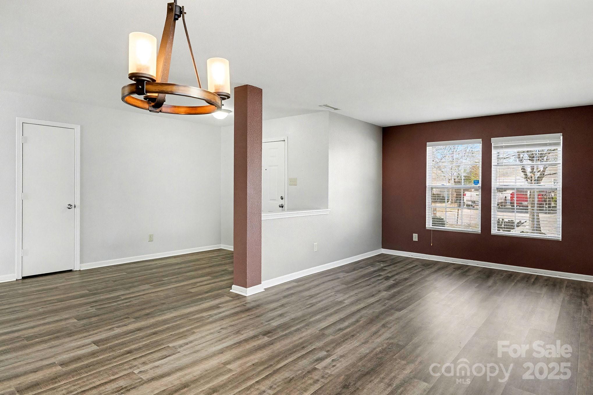 3901 Shasta Circle Clover, SC 29710 - Photo 8 of 36 a view of an empty room with window and wooden floor