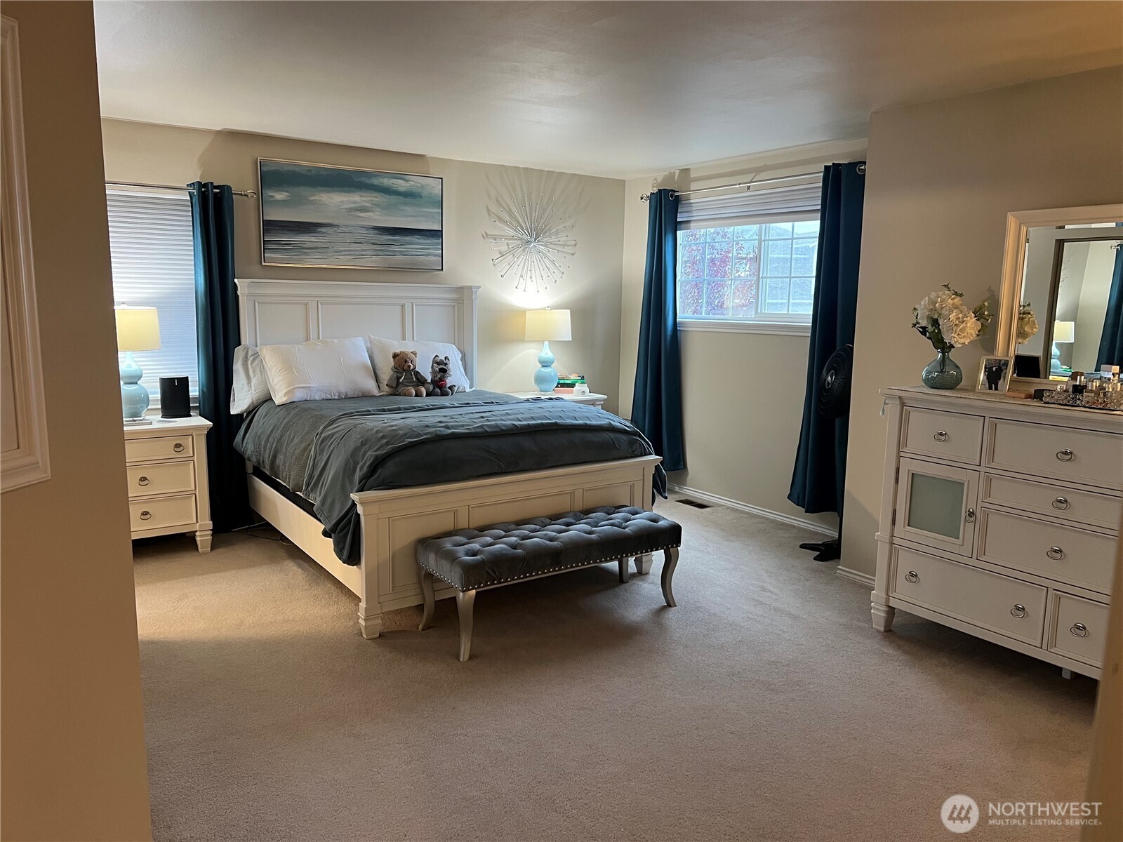 4006 Peters Lane Anacortes, WA 98221 - Photo 2 of 10 a bedroom with a bed and a dresser