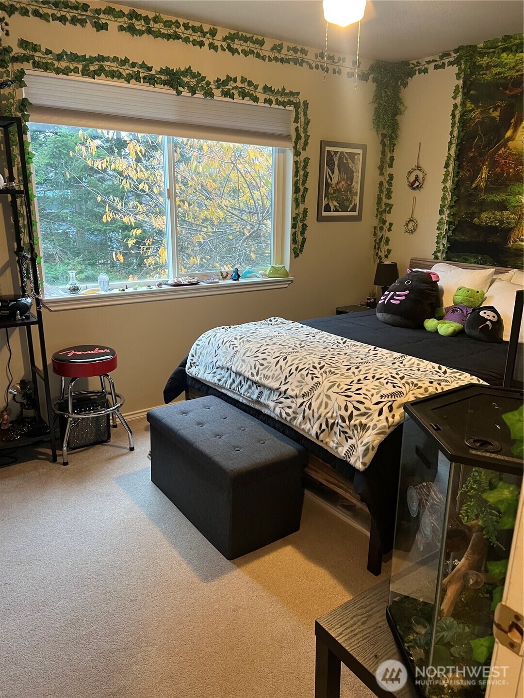 4006 Peters Lane Anacortes, WA 98221 - Photo 3 of 10 a living room with furniture and a floor to ceiling window