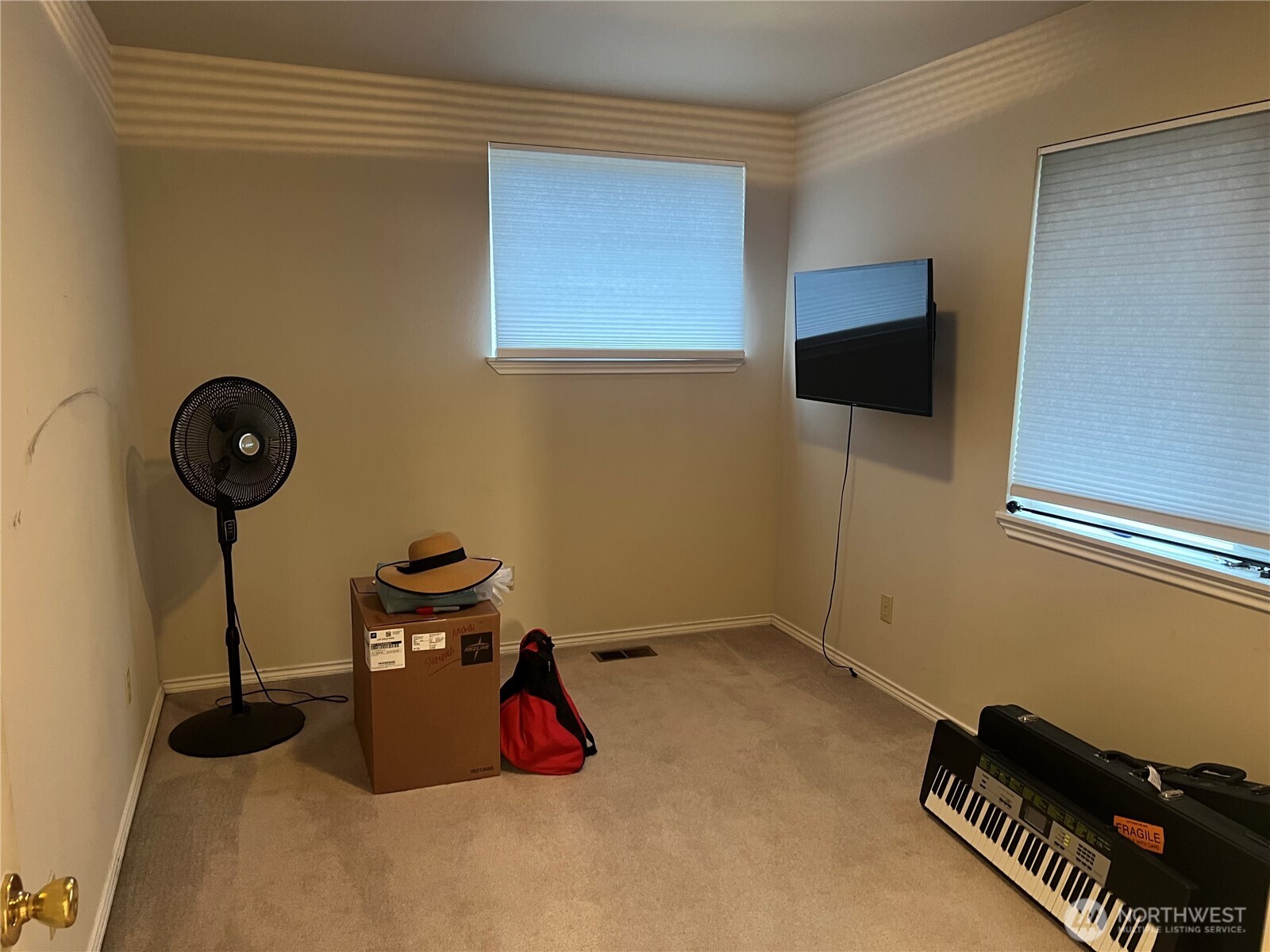 4006 Peters Lane Anacortes, WA 98221 - Photo 6 of 10 a room with furniture and a flat screen tv