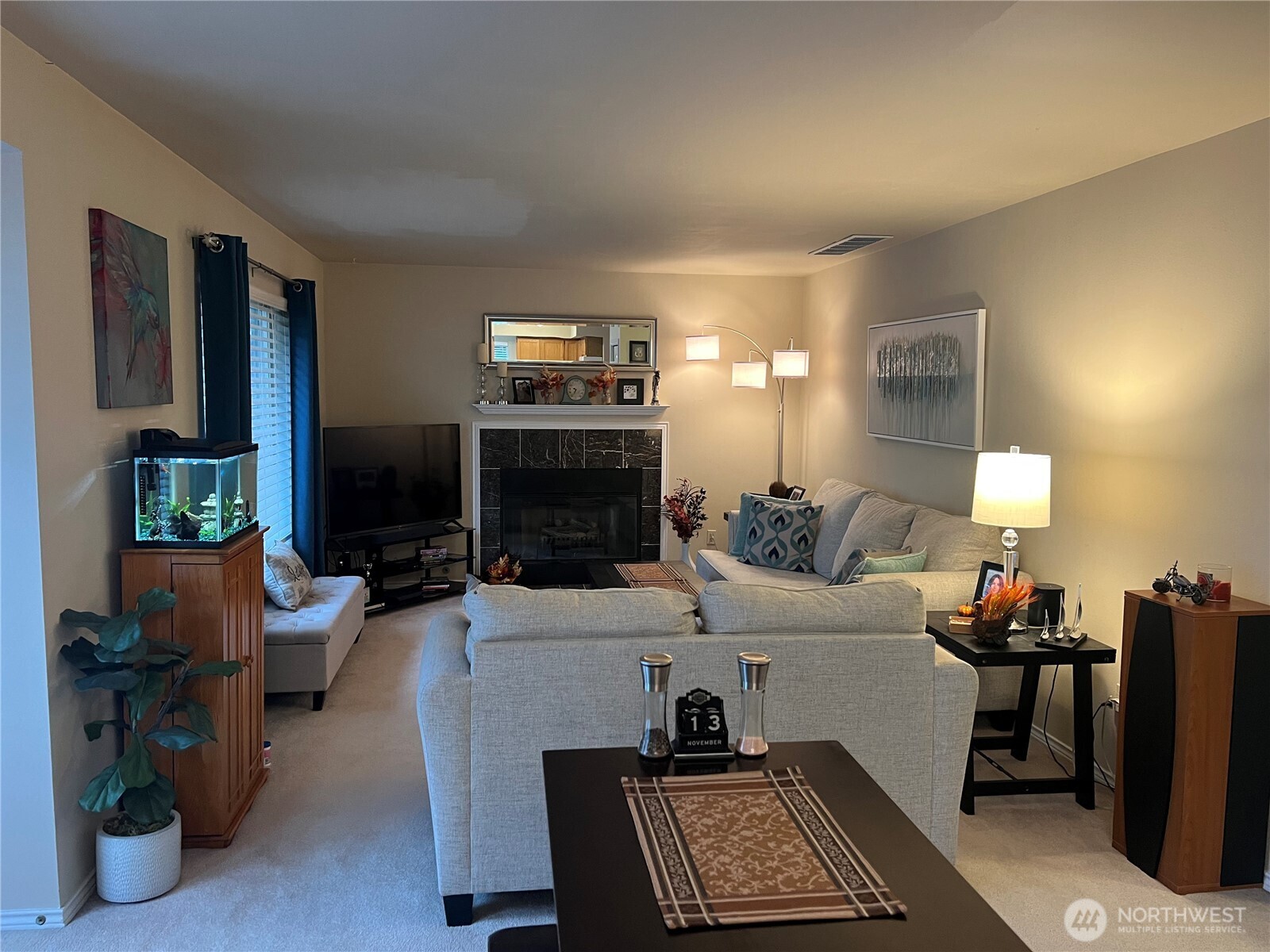 4006 Peters Lane Anacortes, WA 98221 - Photo 7 of 10 a living room with furniture and a flat screen tv