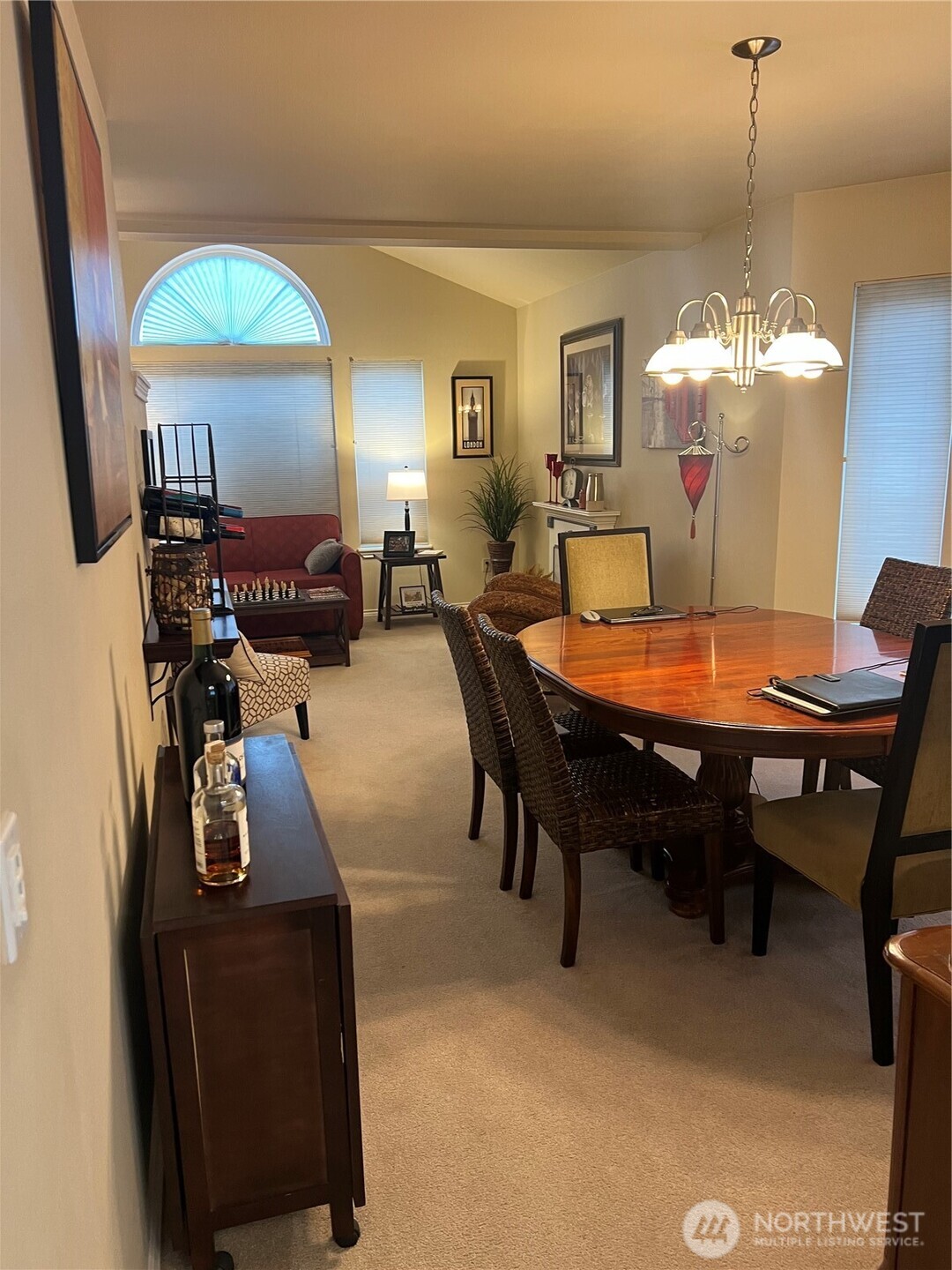 4006 Peters Lane Anacortes, WA 98221 - Photo 8 of 10 a view of a dining room with furniture and chandelier
