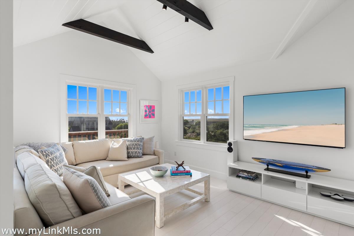 3 Tautemo Way Nantucket, MA 02554 - Photo 14 of 57 a living room with furniture and a flat screen tv