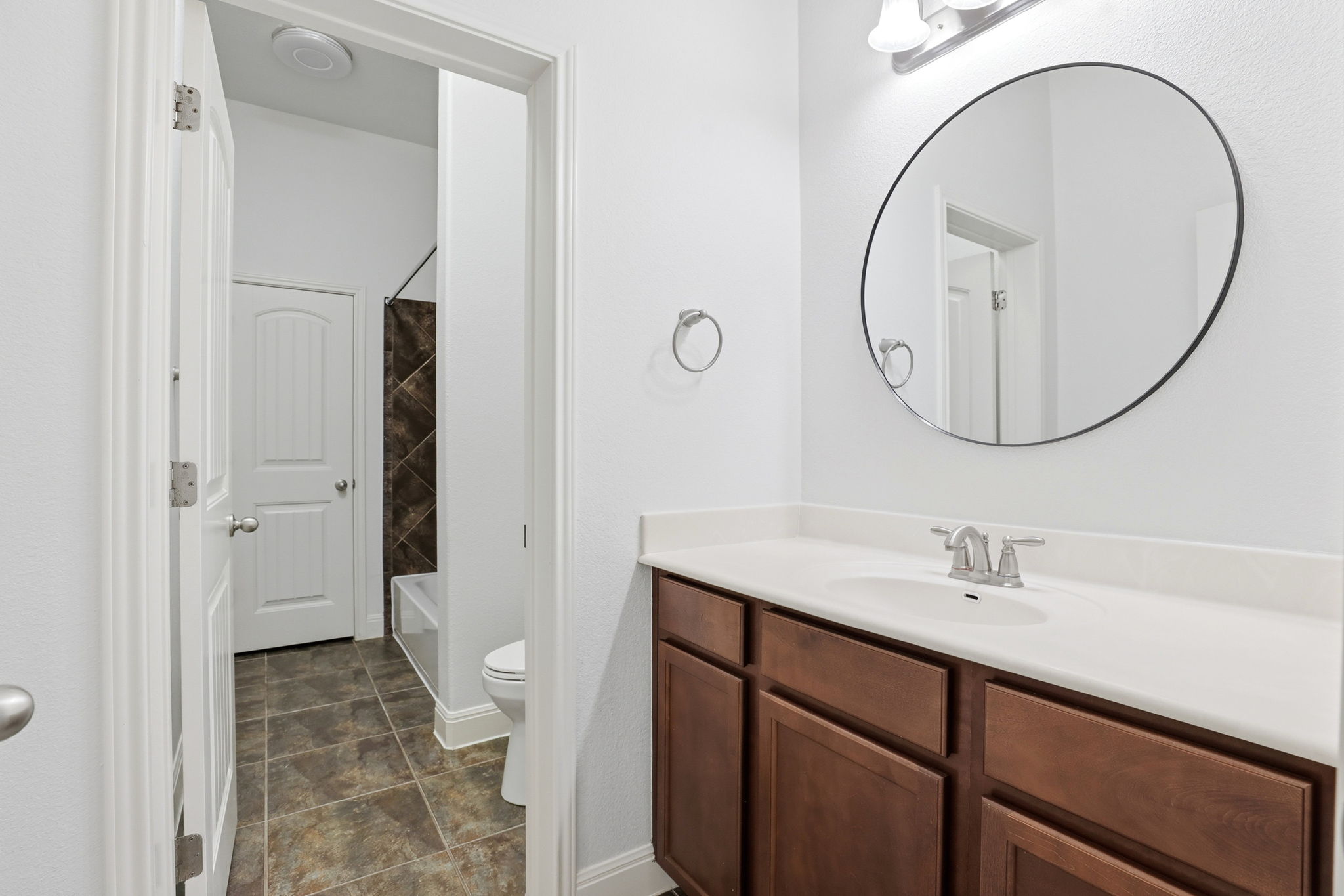 152 Stone View Trail Austin, TX 78737 - Photo 25 of 33 Bathroom featuring vanity and shower / bath combination