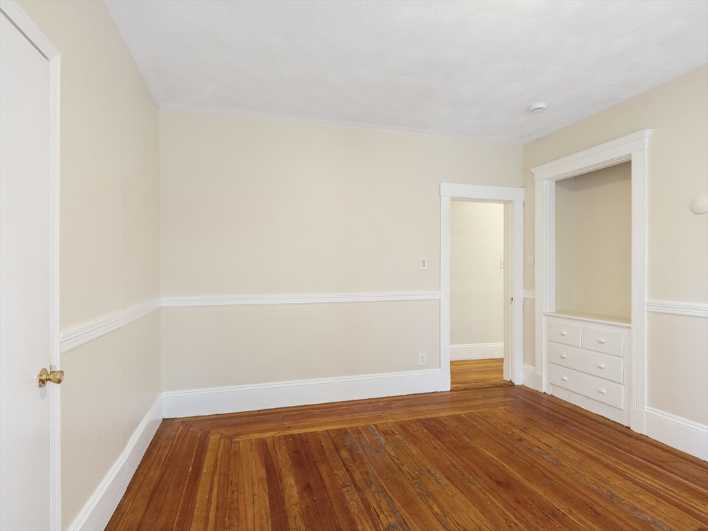 75 Bellingham Street Chelsea, MA 02150 - Photo 23 of 42 a view of small space with wooden floor