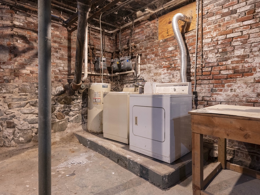 75 Bellingham Street Chelsea, MA 02150 - Photo 38 of 42 a utility room with washer and dryer