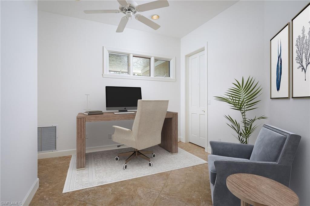 896 Barcarmil Way Naples, FL 34110 - Photo 21 of 45 a work room with furniture and a window