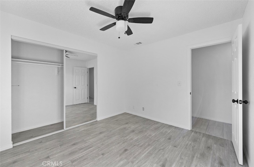 15352 Linden Street Hesperia, CA 92345 - Photo 21 of 39 wooden floor in an empty room