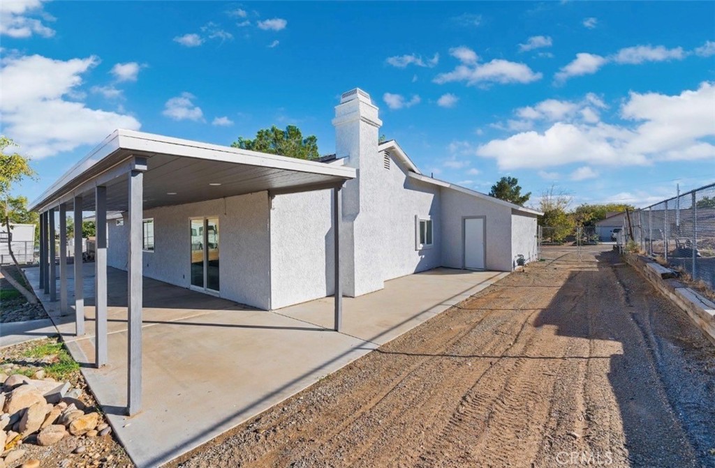 15352 Linden Street Hesperia, CA 92345 - Photo 28 of 39 a view of a house with backyard