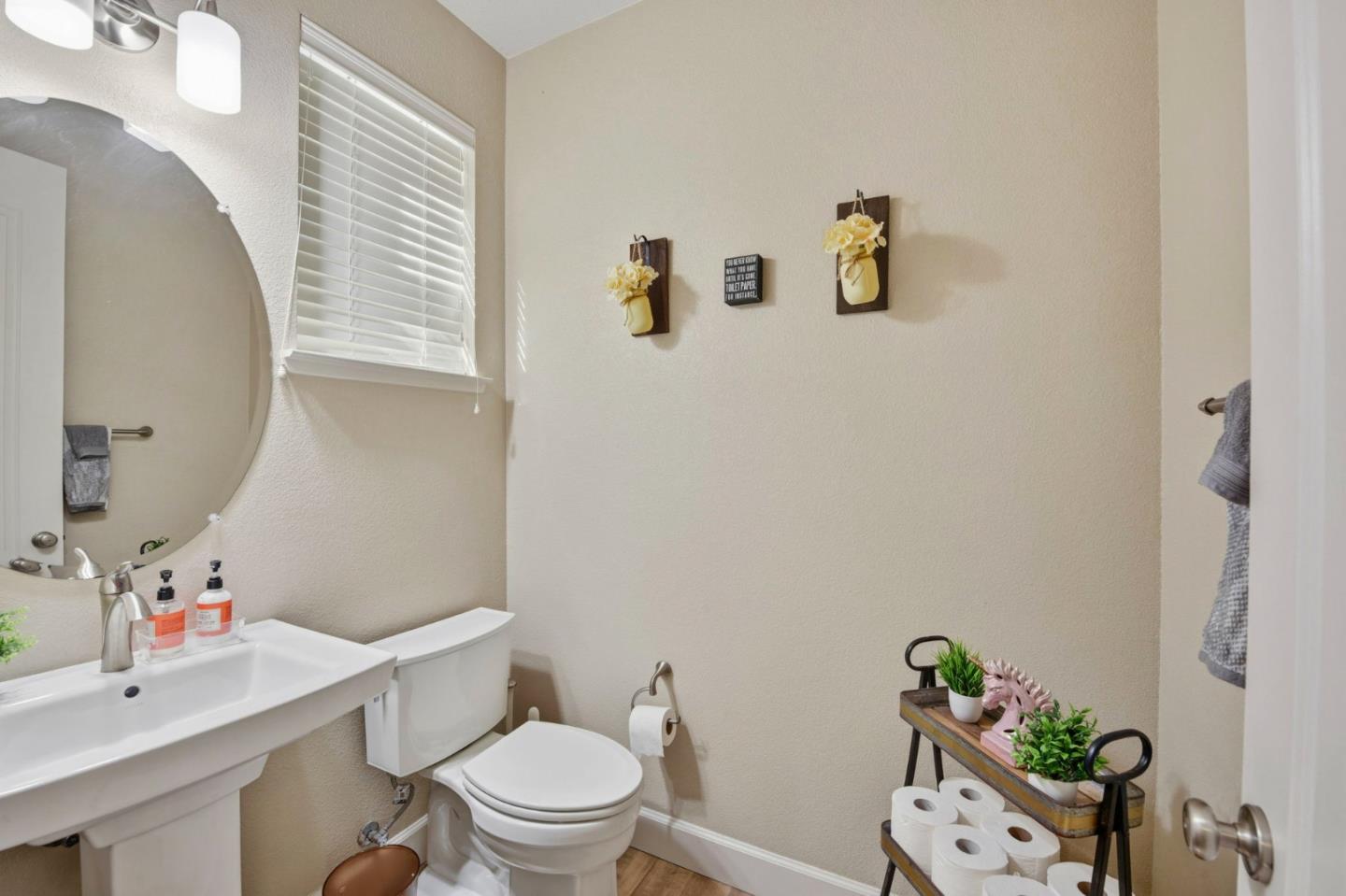 56 Regency Place Hayward, CA 94544 - Photo 29 of 43 a white toilet sitting next to a bathroom sink