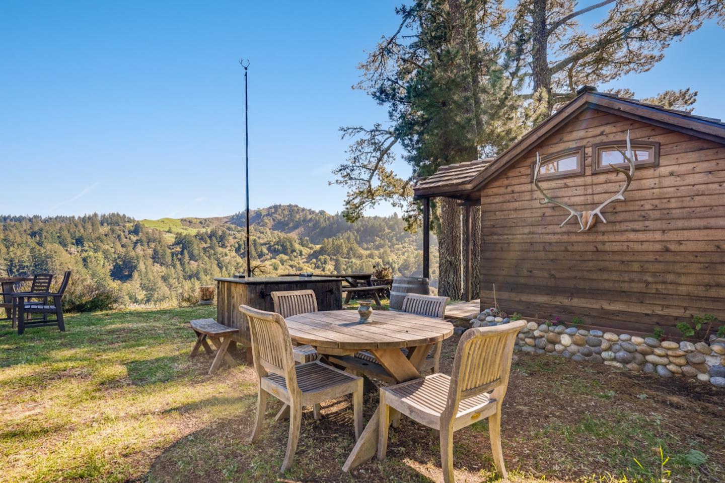 00 Rapley Ranch Road Redwood City, CA 94062 - Photo 13 of 33 a view of an outside dining space with furniture