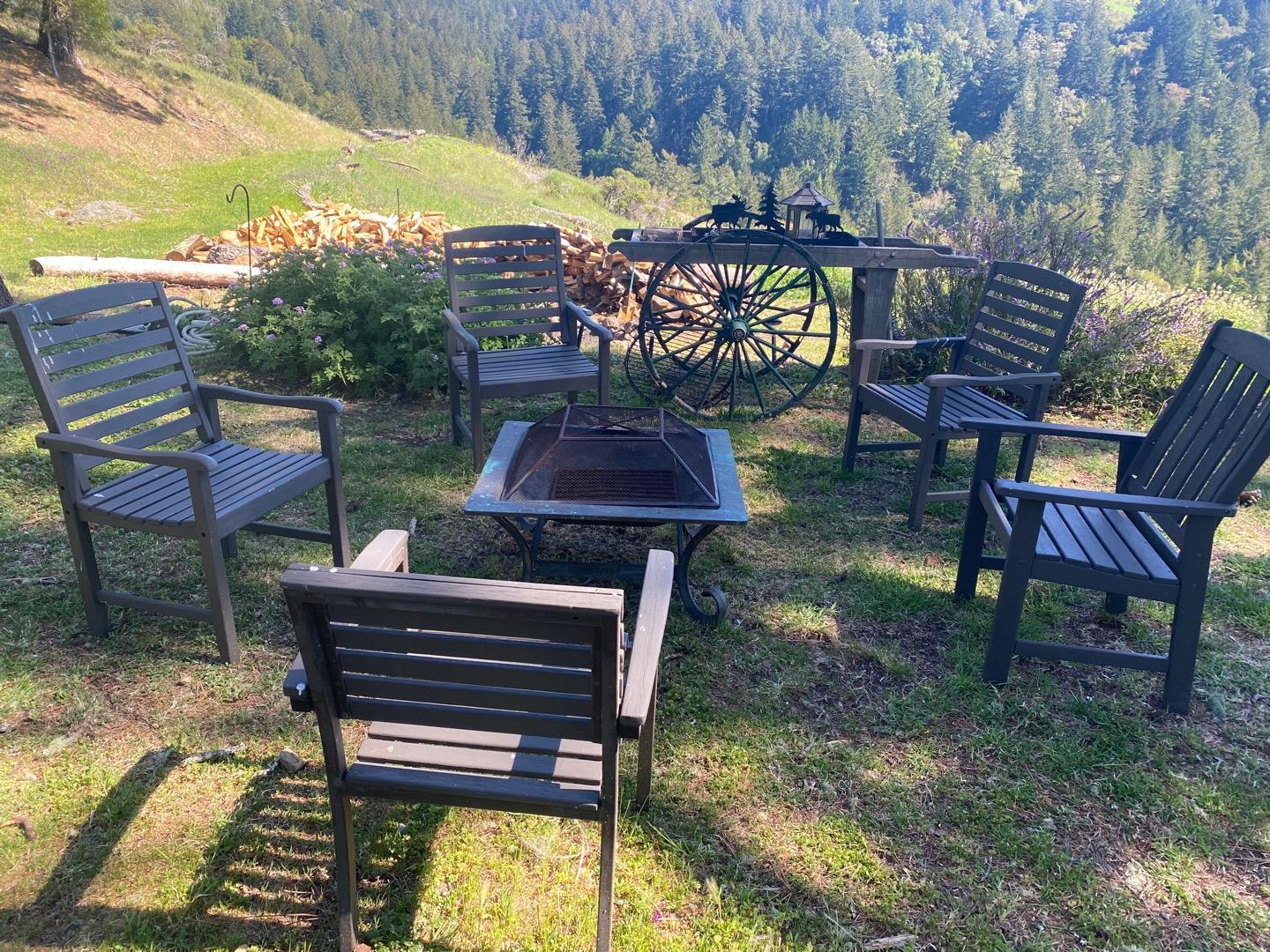 00 Rapley Ranch Road Redwood City, CA 94062 - Photo 26 of 33 a backyard of a house with table and chairs