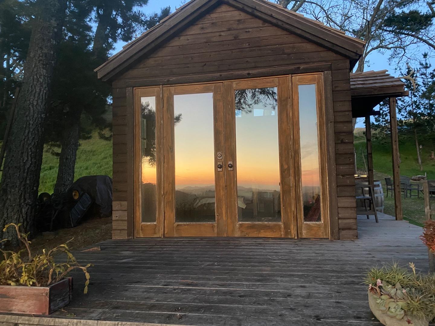 00 Rapley Ranch Road Redwood City, CA 94062 - Photo 4 of 33 a view of a porch with furniture and floor to ceiling window