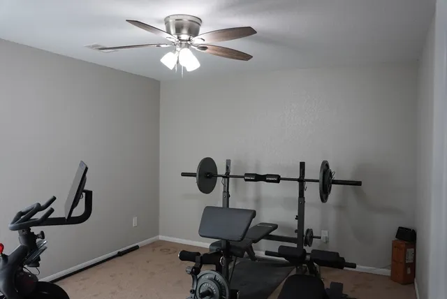 a view of a room with gym equipment