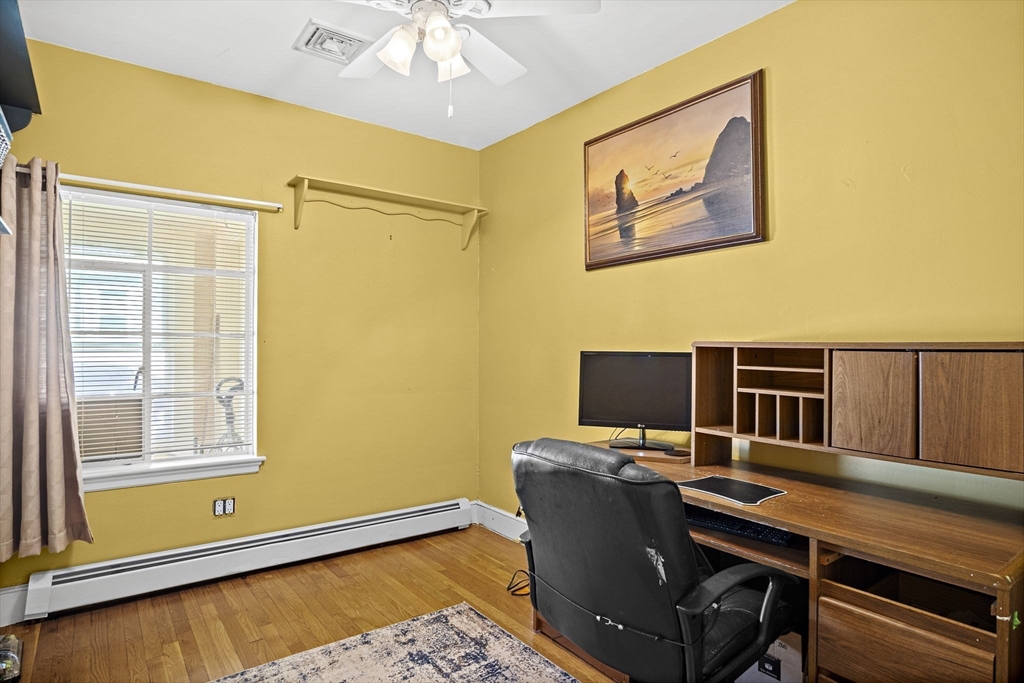 56 Summer Street Saugus, MA 01906 - Photo 14 of 29 a view of a workspace with furniture and a window