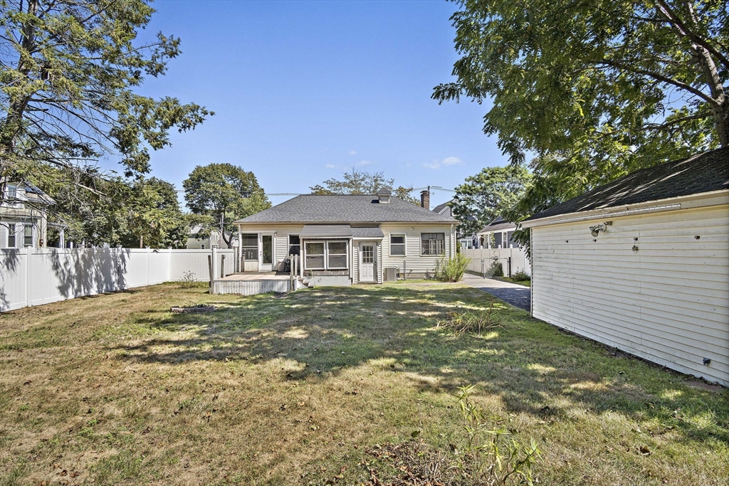 56 Summer Street Saugus, MA 01906 - Photo 24 of 29 a front view of a house with a garden