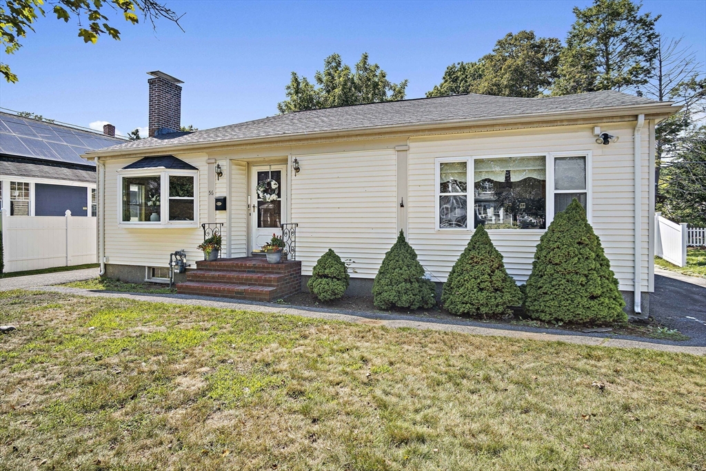 56 Summer Street Saugus, MA 01906 - Photo 27 of 29 a front view of a house with garden