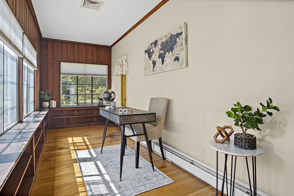 56 Summer Street Saugus, MA 01906 - Photo 5 of 29 a dining room with furniture a rug and a potted plant
