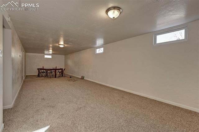 534 Yellowstone Road Colorado Springs, CO 80910 - Photo 26 of 40 Can you imagine a game room or Movie theatre space?