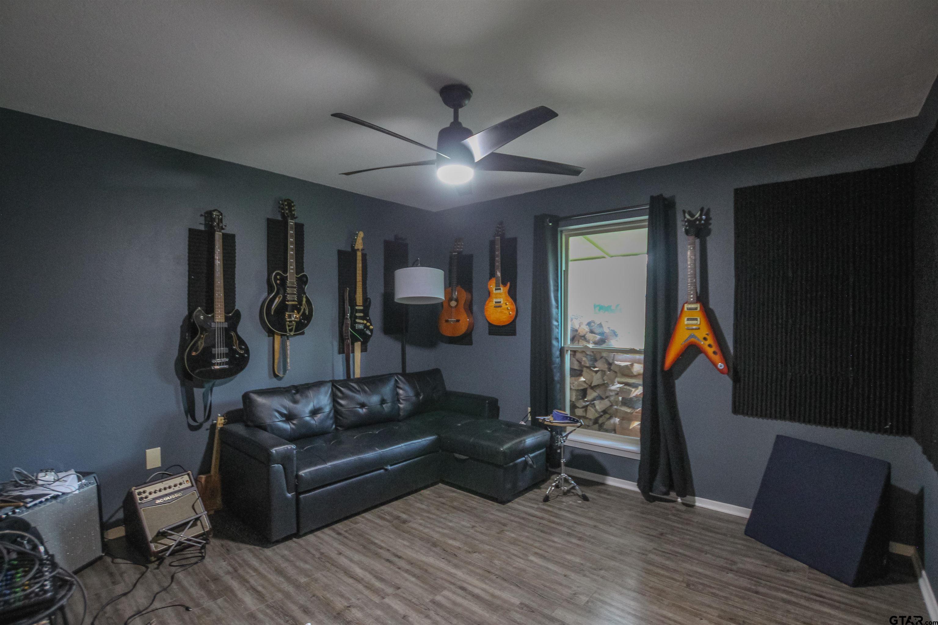 7546 Hill N Dale Road Tyler, TX 75709 - Photo 15 of 24 a living room with furniture