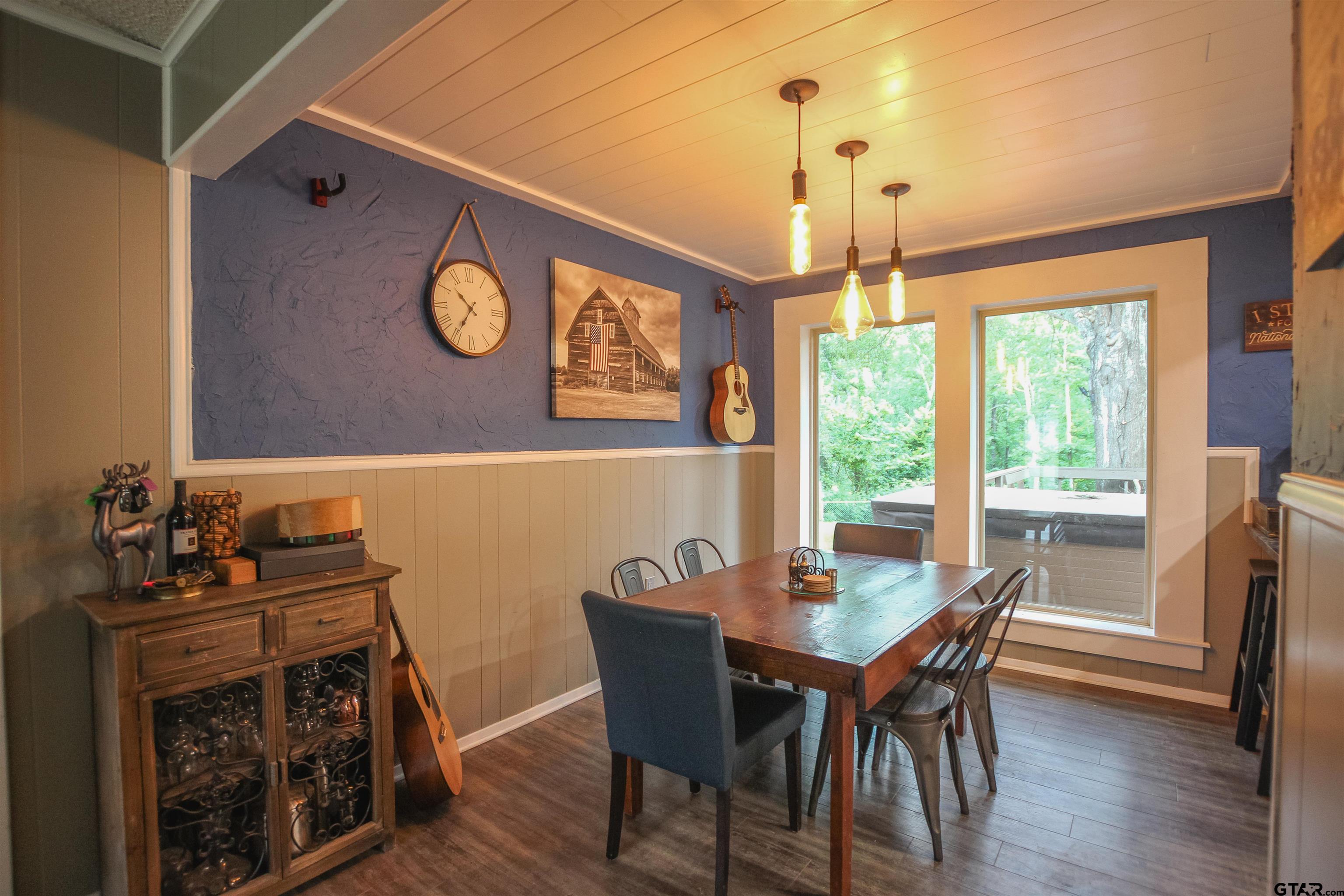 7546 Hill N Dale Road Tyler, TX 75709 - Photo 5 of 24 a view of a dining room with furniture window and wooden floor