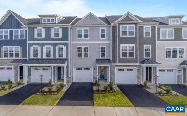a front view of a house with yard