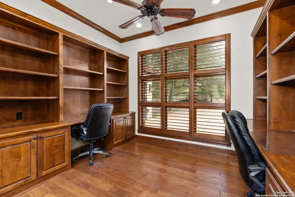 a view of a room with a large window