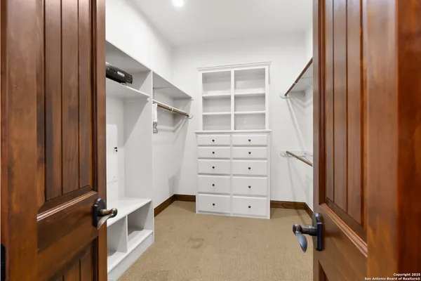 a bed room with a bed and a couch