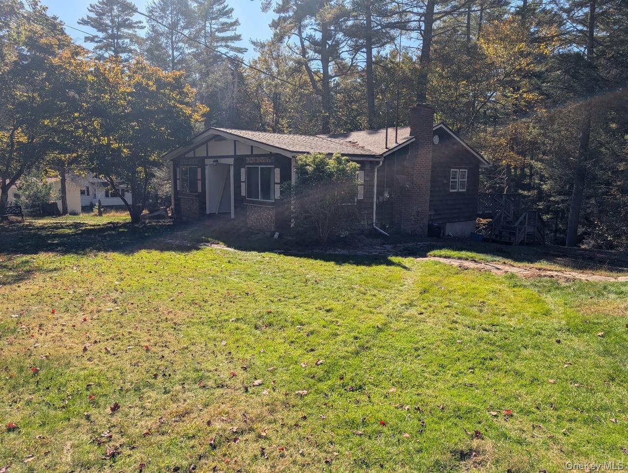 50 Park Road Yulan, NY 12792 - Photo 2 of 14 a front view of a house with a yard