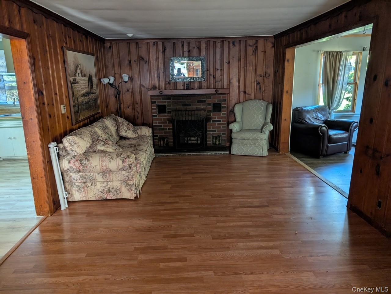 50 Park Road Yulan, NY 12792 - Photo 3 of 14 a living room with furniture and a fireplace