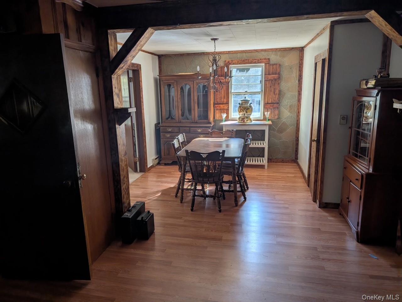 50 Park Road Yulan, NY 12792 - Photo 7 of 14 an open kitchen with dining table and stainless steel appliances