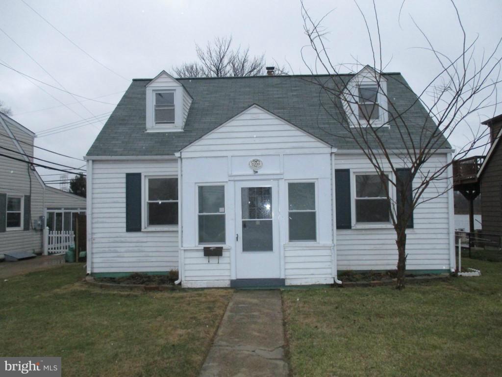 8200 Northview Road Baltimore, MD 21222 - Photo 1 of 14 a front view of a house with a yard