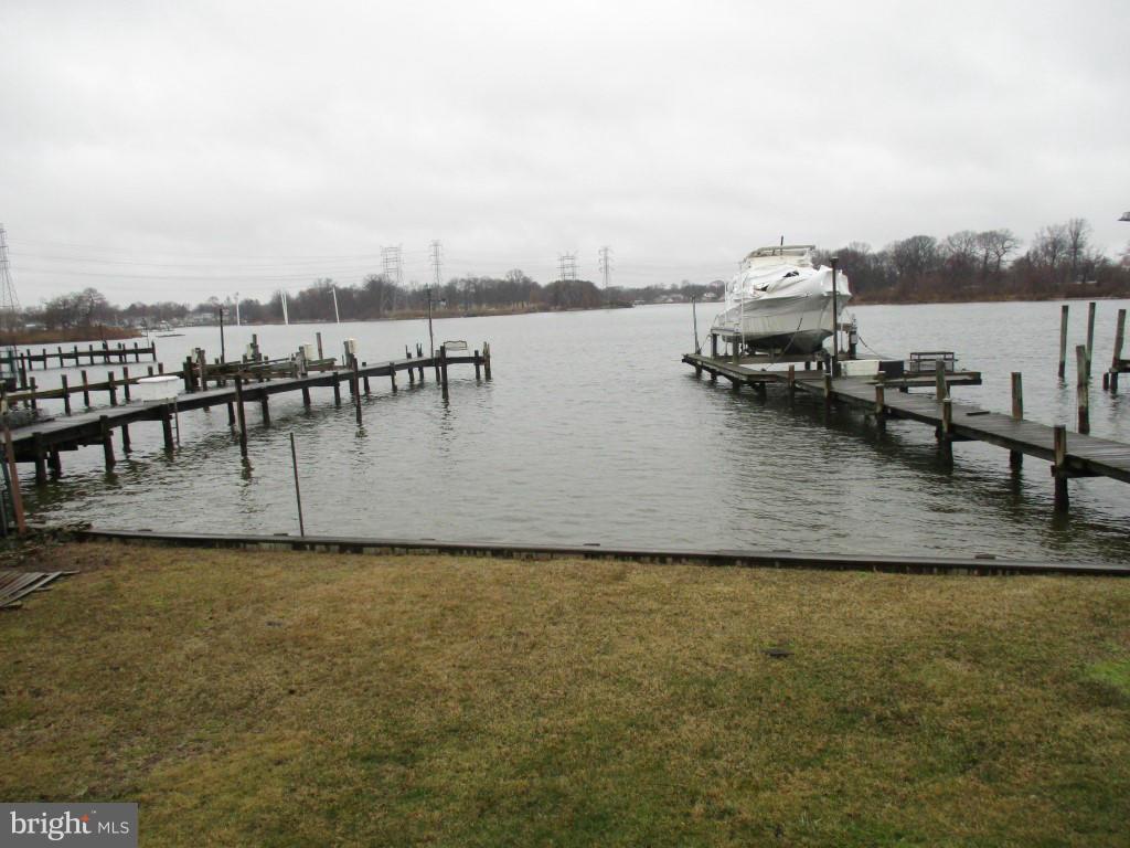 8200 Northview Road Baltimore, MD 21222 - Photo 14 of 14 a view of a lake with boats and trees in the background