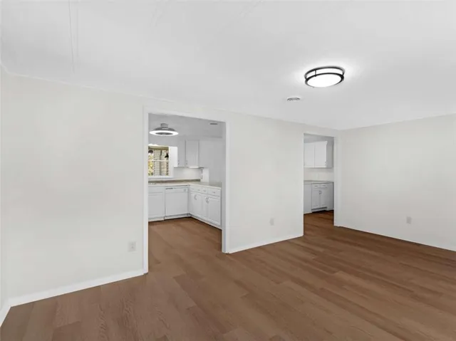 a view of a hallway and a window