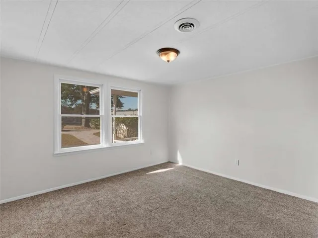 a bathroom with a sink a vanity and a mirror